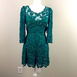 NWT, Free People, Lace Beaded Romper. Embroidery.  Emerald color.  Size 8